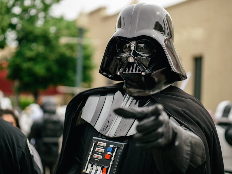 Person in Black Helmet