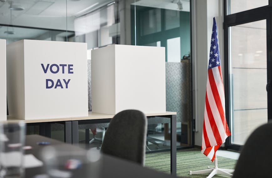 American Flag and Voting Boxes